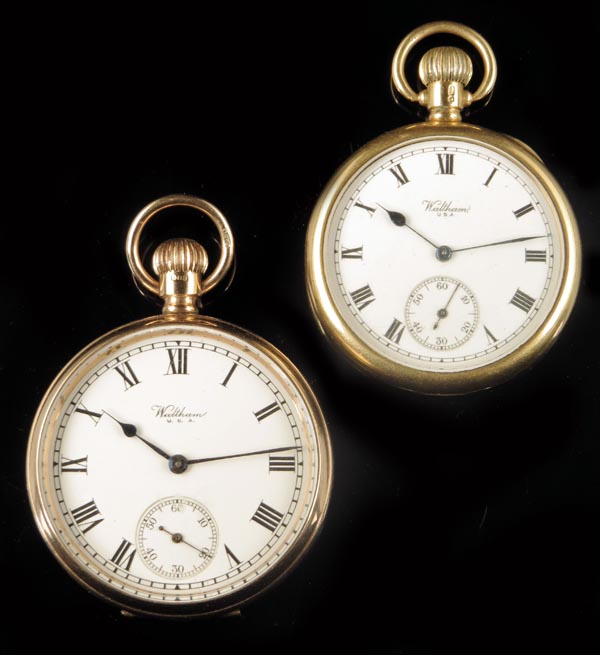 An 18ct gold keyless lever watch, white enamel dial signed Waltham, two-tone damascened nickel