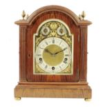 λ A German quarter chiming rosewood mantel clock, the three-train going barrel movement by