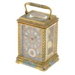An enamel carriage clock with alarm, striking movement numbered 2544, replaced lever platform, the