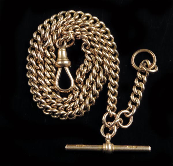 A 15ct gold watch chain, of curb link form, with T bar and single dog clip.