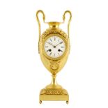 A French empire urn mantel clock, the striking drum movement numbered 2480, in a slender urn case