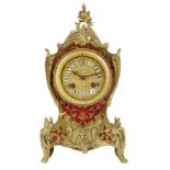 λ A French boulle mantel clock, striking movement numbered 675 with unnumbered pendulum, gilt dial