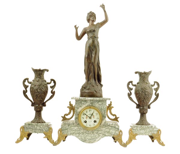 A French bronzed spelter and marble clock garniture, striking movement by S. Marti with floral