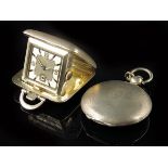 A continental silver hunting cased verge watch, winding through the white enamel dial, in a