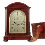 A mahogany quarter chiming bracket clock and bracket, the 8 inch silvered dial signed W.E. Cribb, 30