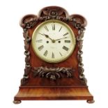 A Victorian mahogany mantel clock, 7.5 inch white painted dial with faded signature, the two-train