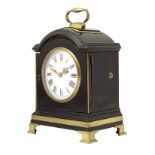 A striking ebonised bracket clock of small size, 4.25 inch white enamel dial, circular plated two-