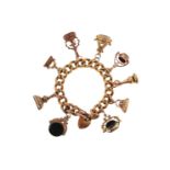 A gold charm bracelet, the 9ct gold curb link bracelet mounted with assorted gold charms. 60g in