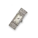 A lady's Art Deco diamond set platinum wristwatch, the rectangular silver dial with Arabic numerals,