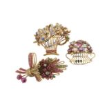 Two gem-set gold giardinetto brooches, with another gem-set gold spray brooch.