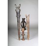 Four Burkina Faso flutes; two of tapering form with forked mouth pieces, 37.5cm and 27cm high, one