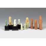 Six Egyptian faience amulets, 4.5cm the highest, four mounted and four faience shabtis. (14)