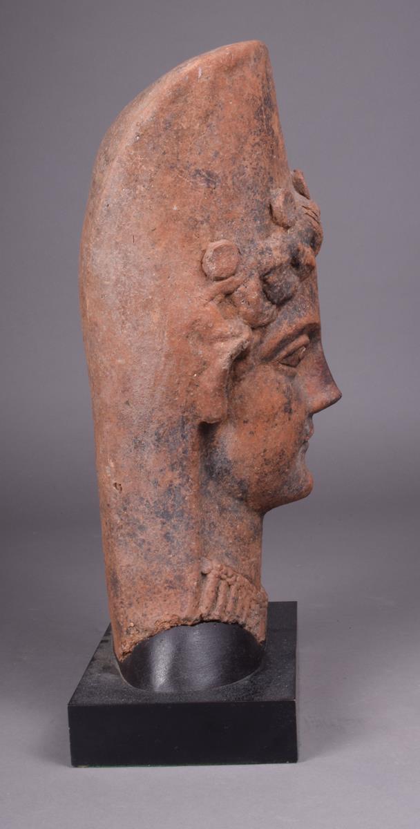 An Etruscan terracotta head of Demeter, with plaited hair and tall diadem with five discs, almond - Image 2 of 4