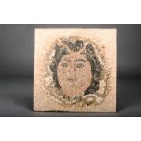 A Roman mosaic, the head of Diana, 23 x 21cm, re-laid on board. Provenance Ex collection John
