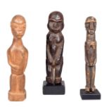 A Lobi standing figure, Burkina Faso, with a relief carved necklace, 15cm with a stand, a Lobi