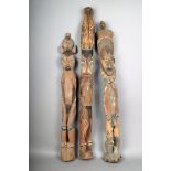 Three Papua New Guinea ancestor figures, with bird and mask crestings, 93cm, 86cm and 79.5cm