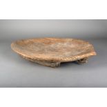 A Vanuatu shallow eliptical wood dish, on sledge runners and with pierced suspension loop, 69cm
