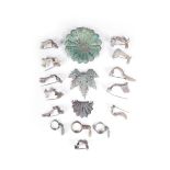 Eleven bronze brooches, with sprung pins, possibly Roman, three Roman bronze key finger rings and