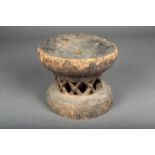 A Congolese stool, wood with a pierced stem, 16.5cm high.