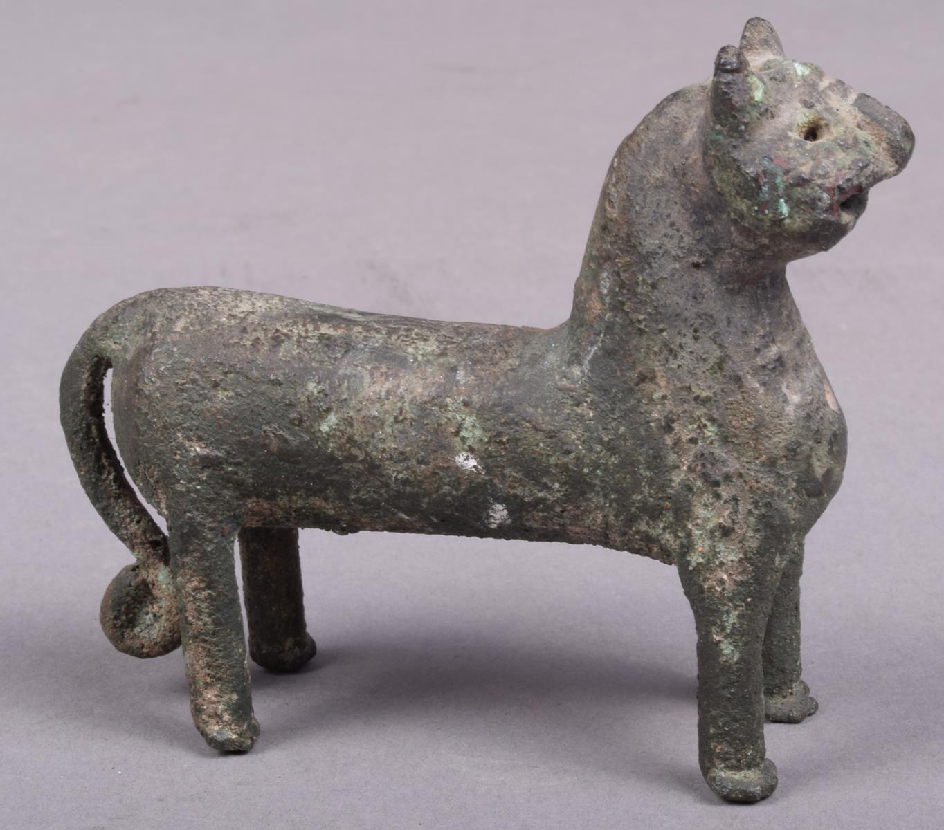 A Elamite bronze feline animal, with a pierced panel chest and scroll tipped tail, 6.5cm high. - Image 4 of 5