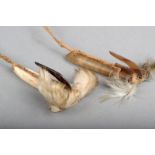 λ Two Tikopia fish hooks, shell, stone, turtle shell, feathers and fibre, 8.5cm and 9cm  long. (2)