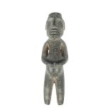 A Mezcala carved greenstone standing figure, 20.5cm high. Provenance Ex English collection,