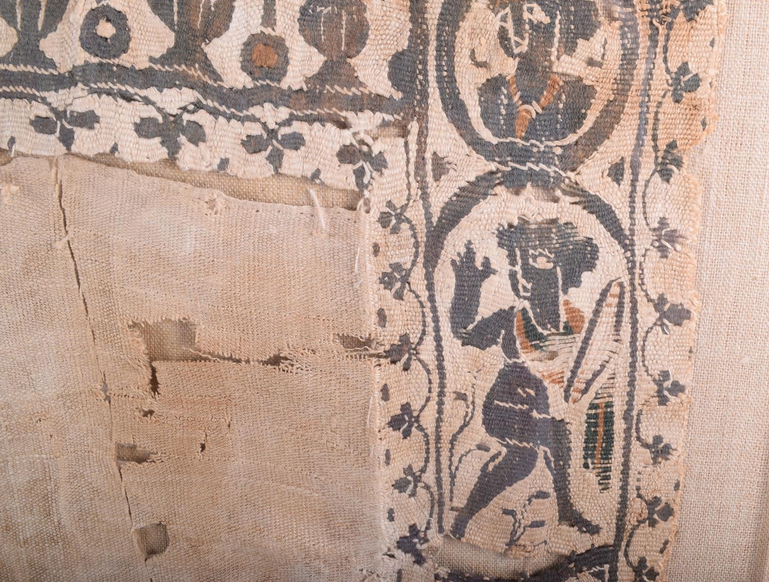 An Egyptian Coptic textile fragment, linen and wool, with classical figures and busts within - Image 4 of 4