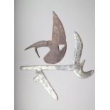 A Kota iron blade, of bird head form with incised decoration, 25cm high and a Congo throwing