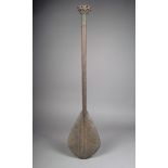 An Austral Islands paddle, Polynesia, all over carved X's with sun motifs, dog tooth and semi