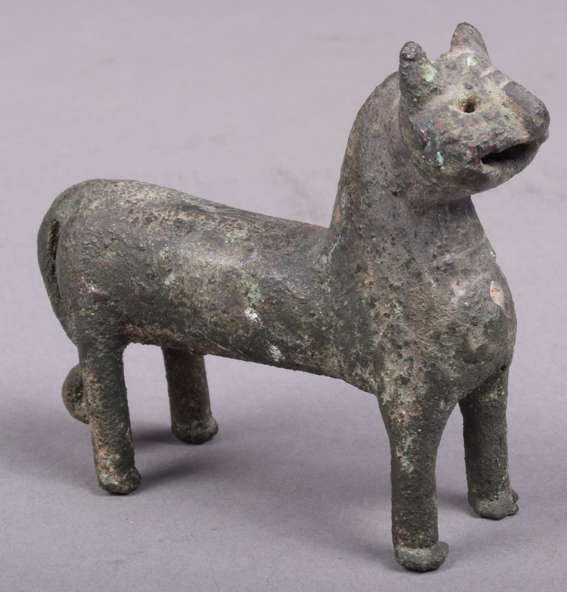 A Elamite bronze feline animal, with a pierced panel chest and scroll tipped tail, 6.5cm high. - Image 2 of 5