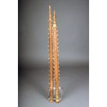 Two Gilbert Islands shark tooth swords, palm wood with fibre binding, 65.5cm and 68.5cm long. (2)