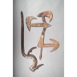 A Congo iron throwing knife, with three crescent shape tips and line decoration, 45cm high and a