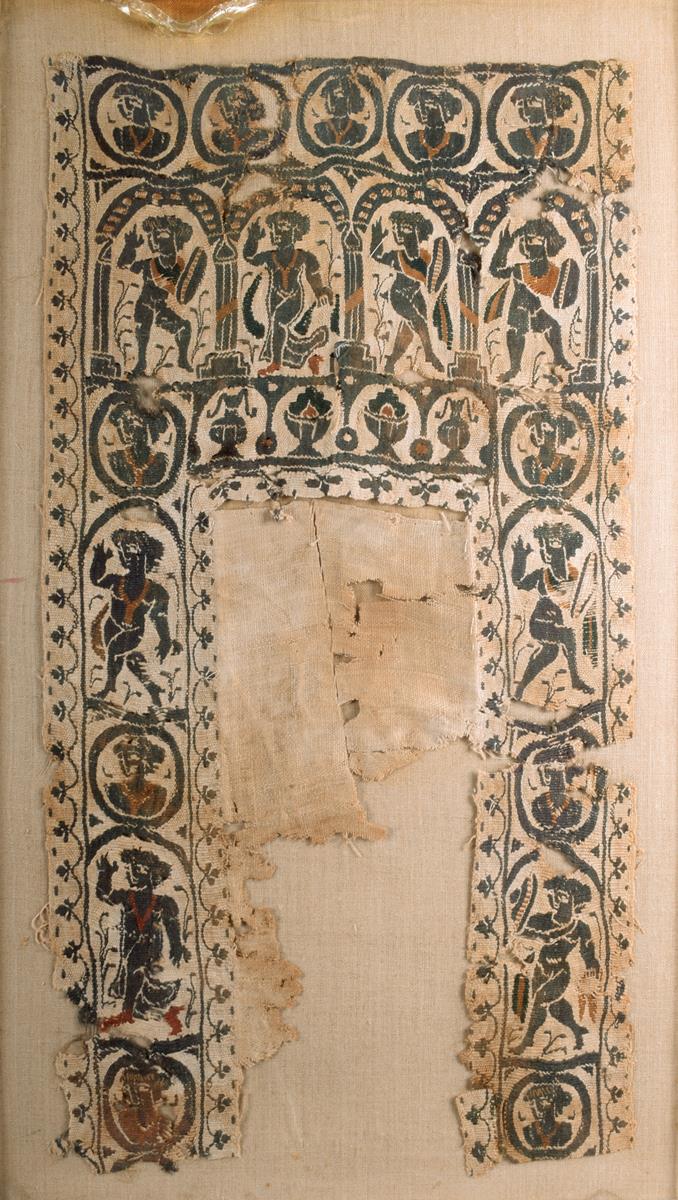An Egyptian Coptic textile fragment, linen and wool, with classical figures and busts within