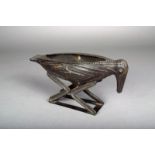 A Bamileke bronze bird vessel, Cameroon, with triangular impressed pattern, 33cm long. Provenance