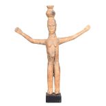 A Lobi standing female figure, Burkina Faso, with outstretched arms and with a pot on her head, 23.