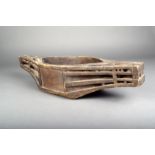 A Hermit Island carrying bowl, Micronesia, of canoe shape, with pierced lugs and allover dog tooth