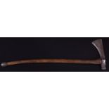 λ A South African rhinoceros horn handled axe, mounted with a British made steel blade, the tapering