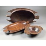 A Tami Islands carved wood bowl, Huon Gulf, oval and as a bird, 55.5cm long, a Tami Islands