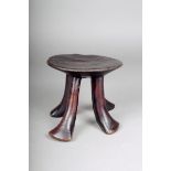 A Pokot stool, Kenya, carved wood, 15.5cm high.