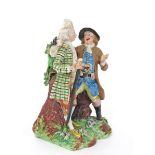 A rare Derby figure group of a Macaroni and a farmer  c.1775-80, the country gent throwing his hands