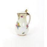 A Vincennes covered jug  date code for 1753, painted by Barbet with sprays of pink and yellow