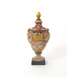 A large and unusual pottery vase and cover  probably 19th century, decorated with a faux marble