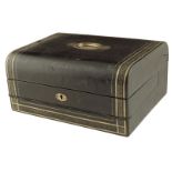 A Victorian black leather writing slope, with gilt tooled decoration, the lid with an engraved