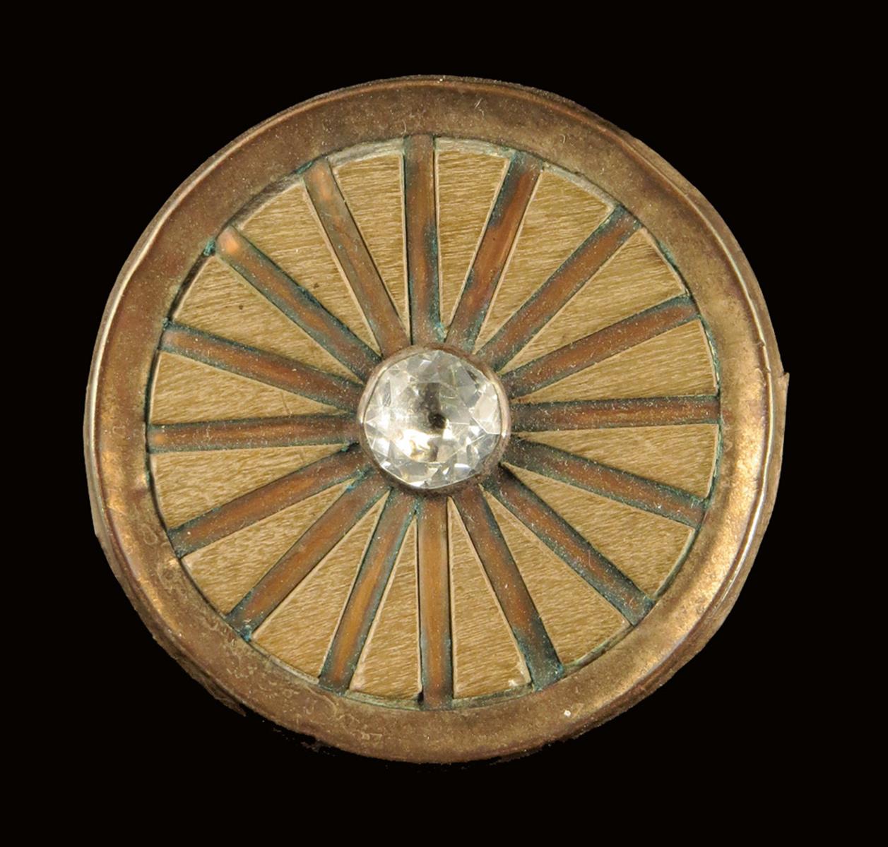 A set of fourteen Louis XVI wood and copper buttons, with a radiating design, the centre with a