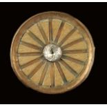 A set of fourteen Louis XVI wood and copper buttons, with a radiating design, the centre with a
