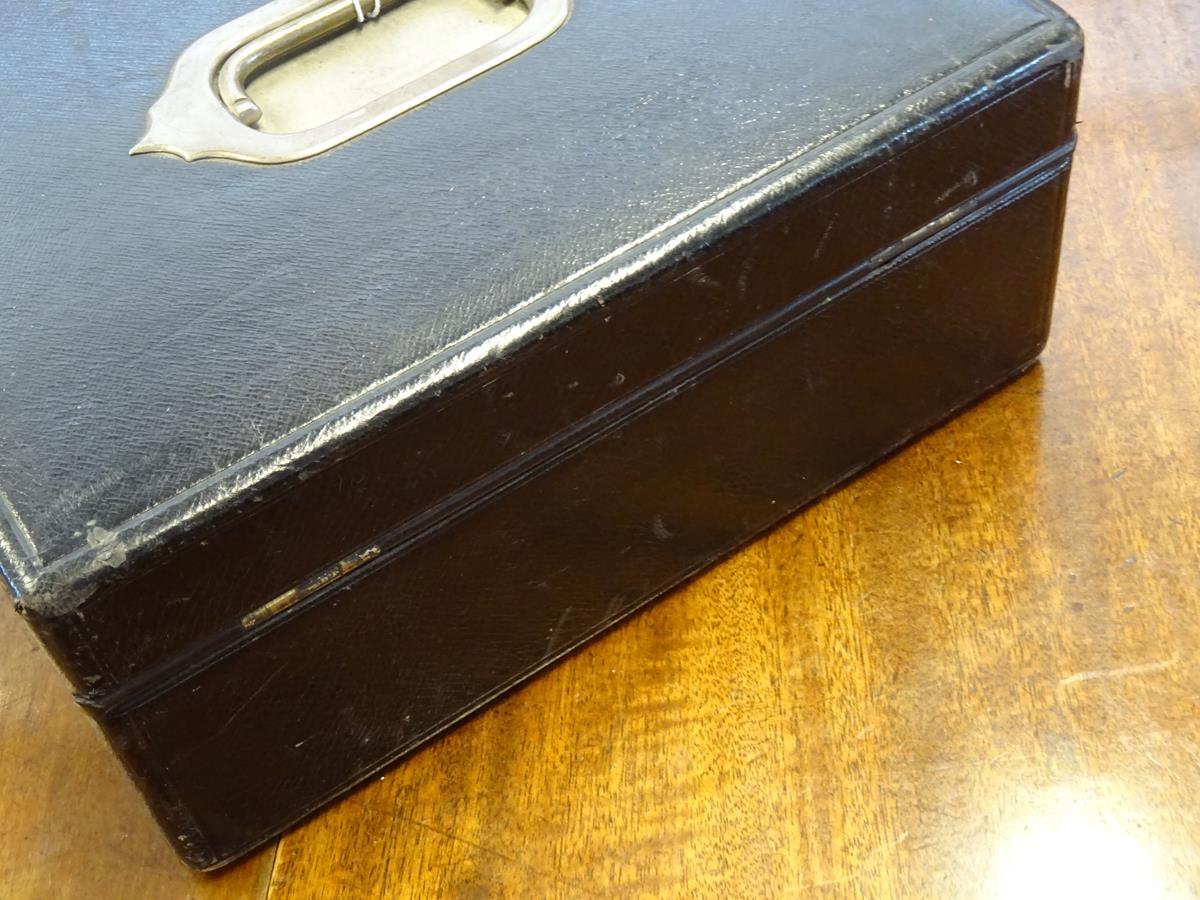 An early 20th century black leather writing box by Asprey, the hinged lid with a sunken brass handle - Image 6 of 13
