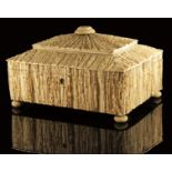 λ An Anglo-Indian elk horn sewing box, of sarcophagus shape, the sandalwood lined interior with horn