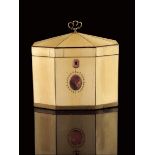 λ A George III ivory octagonal tea caddy, with tortoiseshell stringing and horn banding, the tent