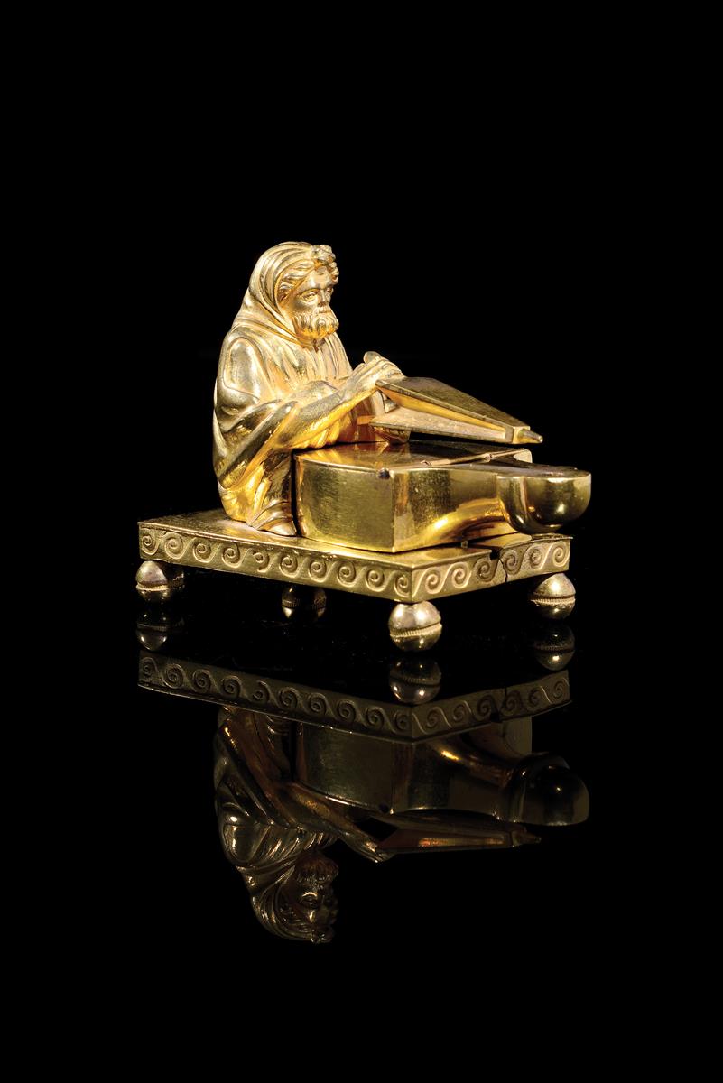 A Regency gilt bronze perfume burner attributed to Vulliamy & Son, modelled with a cloaked bearded