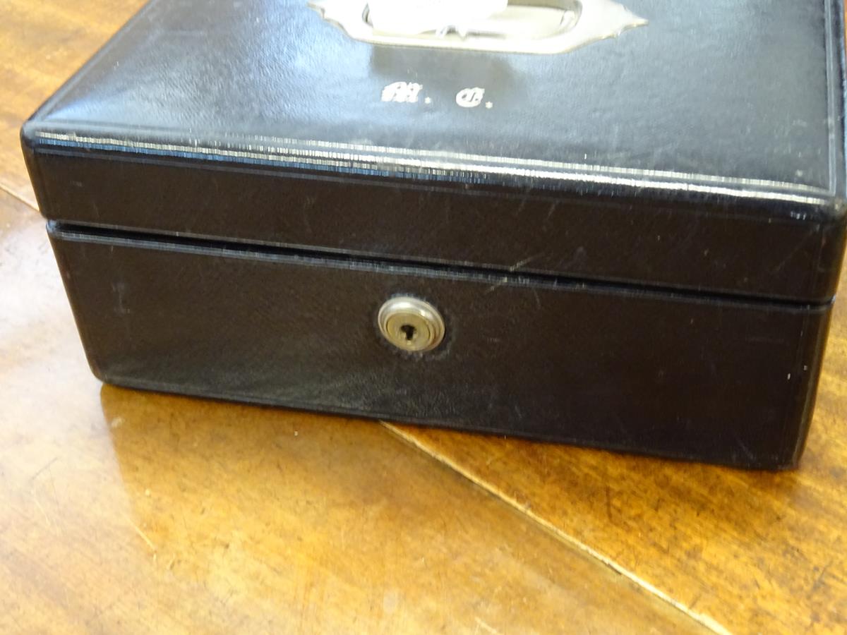 An early 20th century black leather writing box by Asprey, the hinged lid with a sunken brass handle - Image 4 of 13